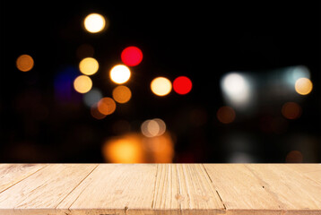 Empty wooden table in front of abstract blurred background of coffee shop . can be used for display or montage your products.Mock up for display of product