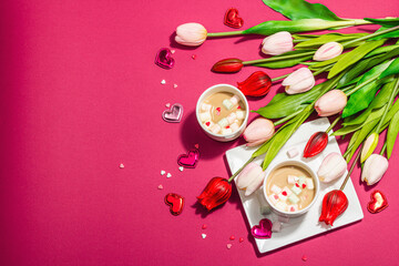 Valentine's Day romantic concept. Coffee with marshmallows, tulips flowers, traditional design