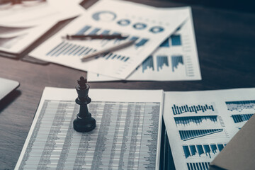 The King in chess pieces is placed on financial documents to signify being the best in business....