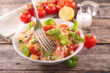 Tabbouleh, mixed vegetable salad with tomato, cucmber and basil