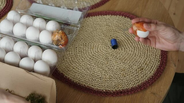 Add leaves and onion skin on egg for Easter coloring.