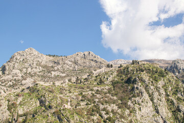 The ruins of the fortress wall on the mountain in Kotor Bay