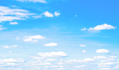  fluffy rice color clods blue sky background - obrazy, fototapety, plakaty
