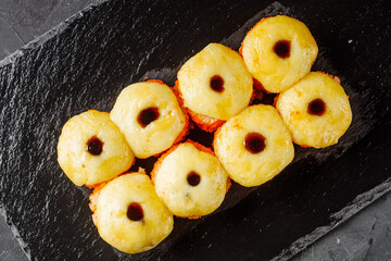 warm sushi roll with tuna and cheese cap