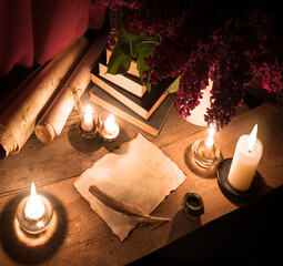 Ancient still life. Pen, paper and candles