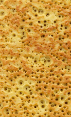 Textured background of delicious fried pancake