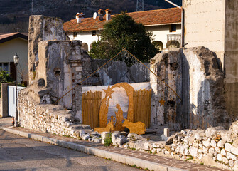 Venzone, Italy - December 29, 2022: Christmas nativity scene in the ruins of the medieval church of...