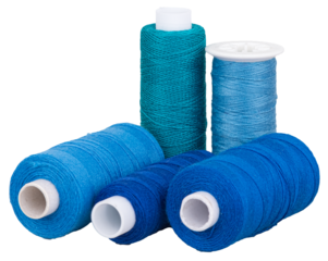 Spools with blue thread and for sewing, supply for sewing, isolated objects 

