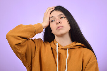 cute brunette woman with headache