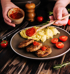 grandma cooked cutlets with mashed potatoes