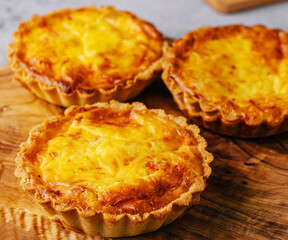 Mini quiche lorraine with cheddar cheese