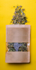 Paper bag with scattered different dried tea