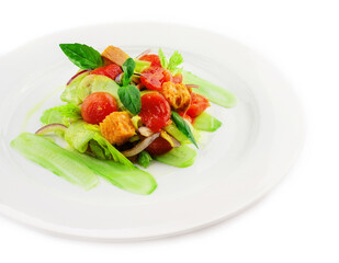 warm salad of stewed cherry tomatoes, cucumbers and croutons