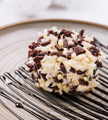 chocolate and vanilla crumb ball on plate