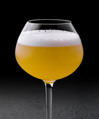 refreshing passionfruit martini cocktail on stone