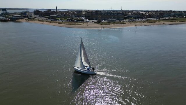 Orbit of yacht on calm sea with orbit revealing river mouth at Fleetwood and Knott End Lancashire UK