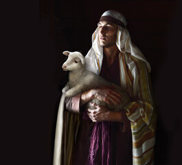 Shepherd hold a sheep in his arms