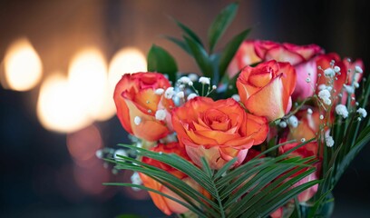 Close-up shot of a bouquet with roses with bokeh in the background