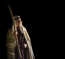 Ancient man with wooden wand