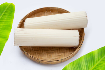 Banana stem for cooking on white background.