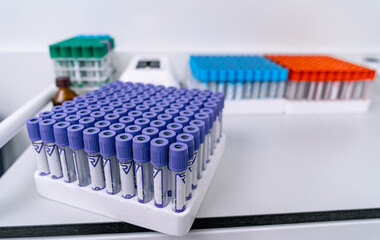 Empty sterile blood test tubes. Rack with blood exa medical tubes.