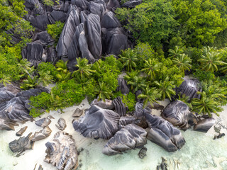 Aerial view of Anse Source d'Argent with its huge granite rocks and palm trees