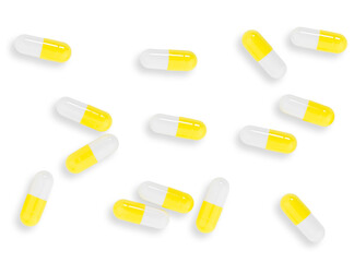 Seamless pattern of yellow and white capsules pill spread on white background with shadow. Health insurance and healthcare concept.