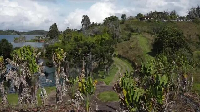 Drone shot over  La Manuela Hacienda ruins near seascape on a windy and gloomy day