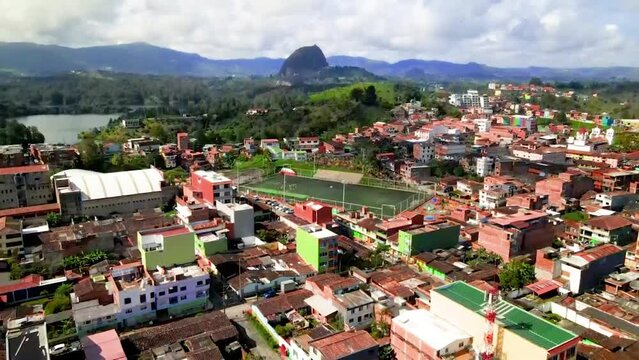 Drone aerial shot of Fresno townscape in Colombia on a sunny day, cloudy sky background