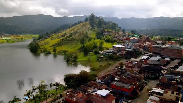 Drone aerial shot of Fresno townscape in Colombia on a sunny day, cloudy sky background