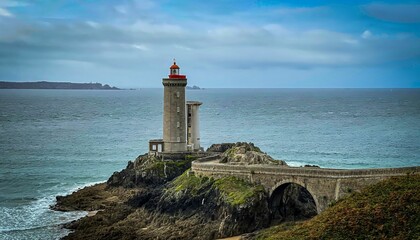 Scenic aerial view of Le Phare du Petit Minou lighthouse on cloudy day in Plouzane, France