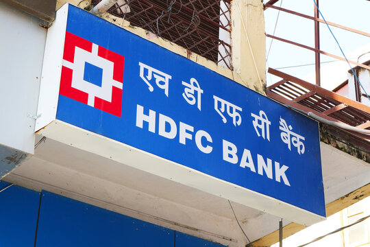 Banner with the name HDFC bank above the entrance to the bank branch. Rishikesh, India, 2023