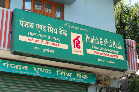 Punjab and Sind Bank sign above the entrance to a bank service center in Raivala, Uttarakhand, India, April 4, 2023