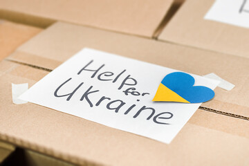 cardboard boxes with the inscription Help for Ukraine