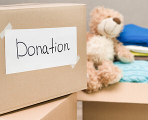 cardboard boxes with donations for the poor and orphanages with toys and clothes