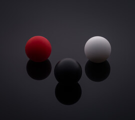 three spheres on black background