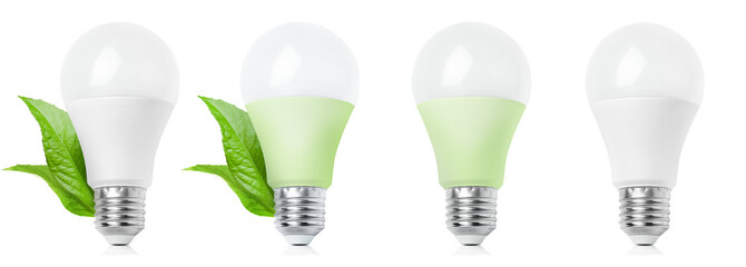 collection of four led light bulbs with leaves, ecological concept of saving electricity, on a...