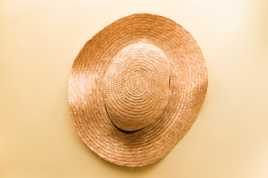 Flat lay hat on yellow background