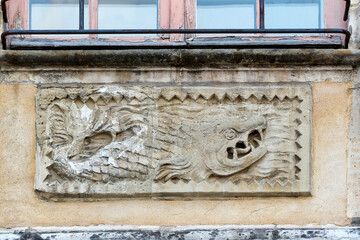bas-reliefs carved on a facade of Heroes square in Arras, Northern France
