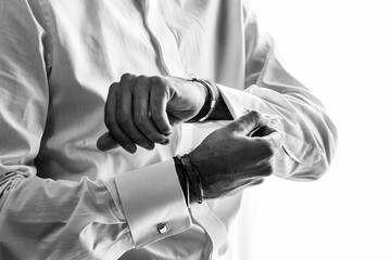 Goom preparing before the wedding. Black and white.