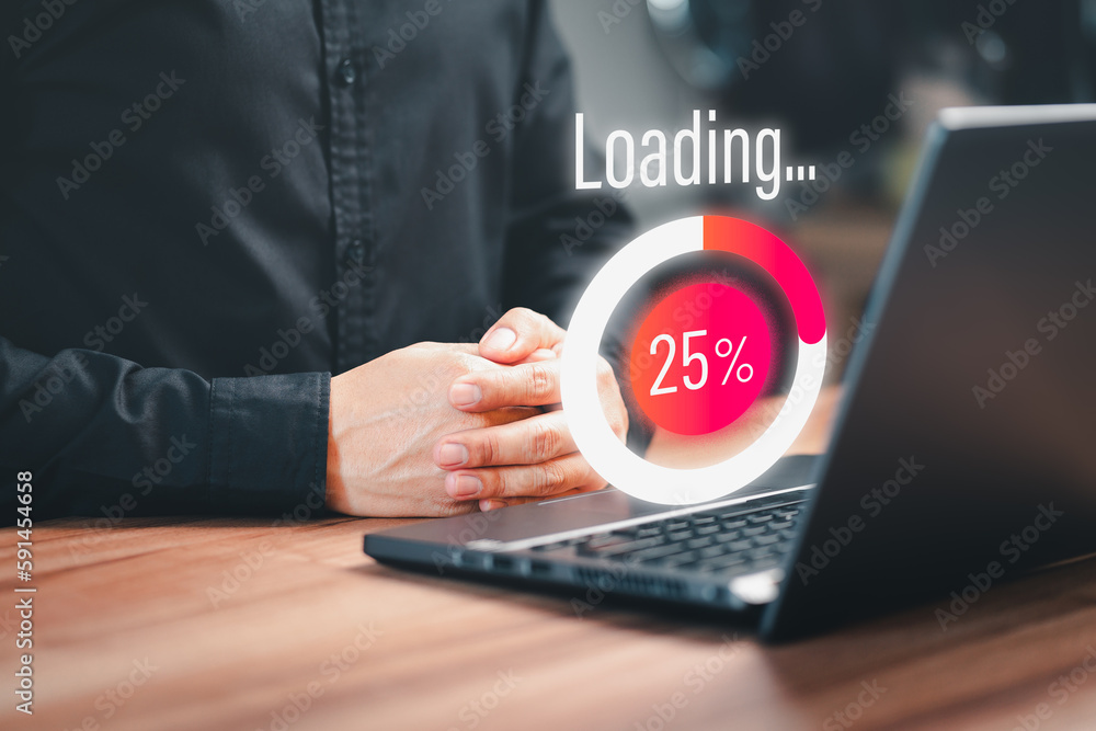 Poster Employee man using a laptop computer for download software and waiting to loading digital business data form website, very slow internet form wifi. Concept of waiting for load of loading symbol.