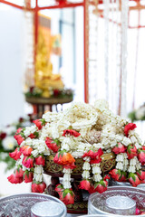Closeup crown flower garland thai handcraft with rose. Thai traditional gift for important day such as Thai mothers day or Songkran festival.