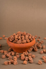 Black Chickpeas or Kala Chana with chana dal pulse isolated on wooden Background.