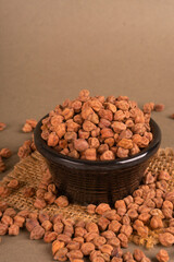 Black Chickpeas or Kala Chana with chana dal pulse isolated on wooden Background.
