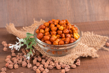 Black Chickpeas or Kala Chana with chana dal pulse isolated on wooden Background.