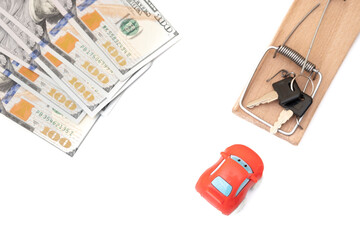 The keys to the door and the car are in the mousetrap. Banknotes, a car, a bunch of keys, a...