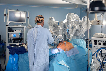 Surgical system with minimally invasive robot in a hospital. Robotic technological equipment,...