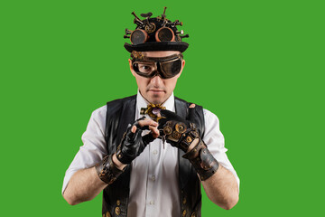 Portrait of man in steampunk style. Victorian man in alternative history. Isolated on green...