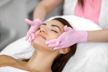 Obraz na płótnie Canvas Facial acupuncture,Cosmetology service,Facial treatment Rejuvenation treatment,Blackhead removal