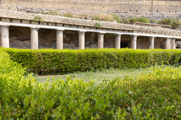Fototapeta na wymiar Ruins of an ancient city destroyed by the eruption of the volcano Vesuvius in 79 AD near Naples, Herculaneum, Italy.